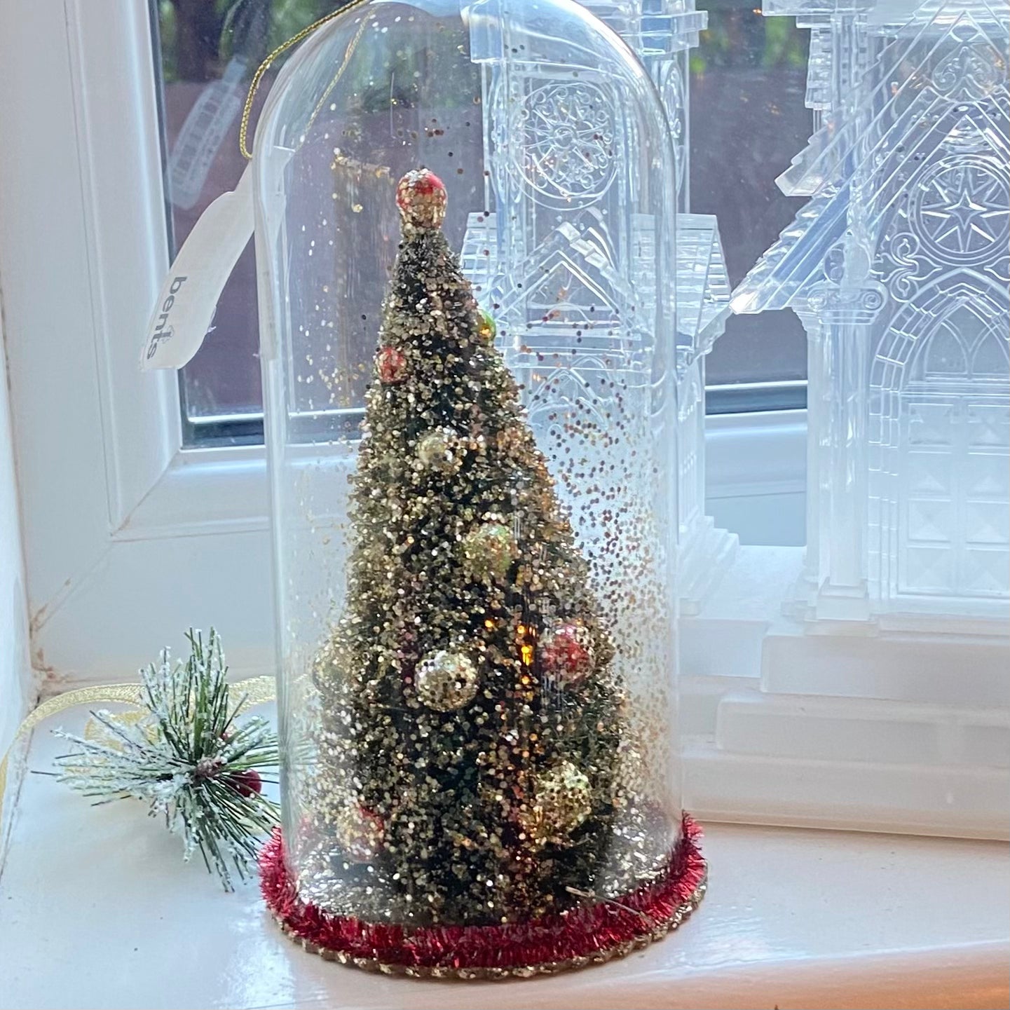 Christmas Tree Decoration in a Glass Dome. Beautiful Holiday Decoration