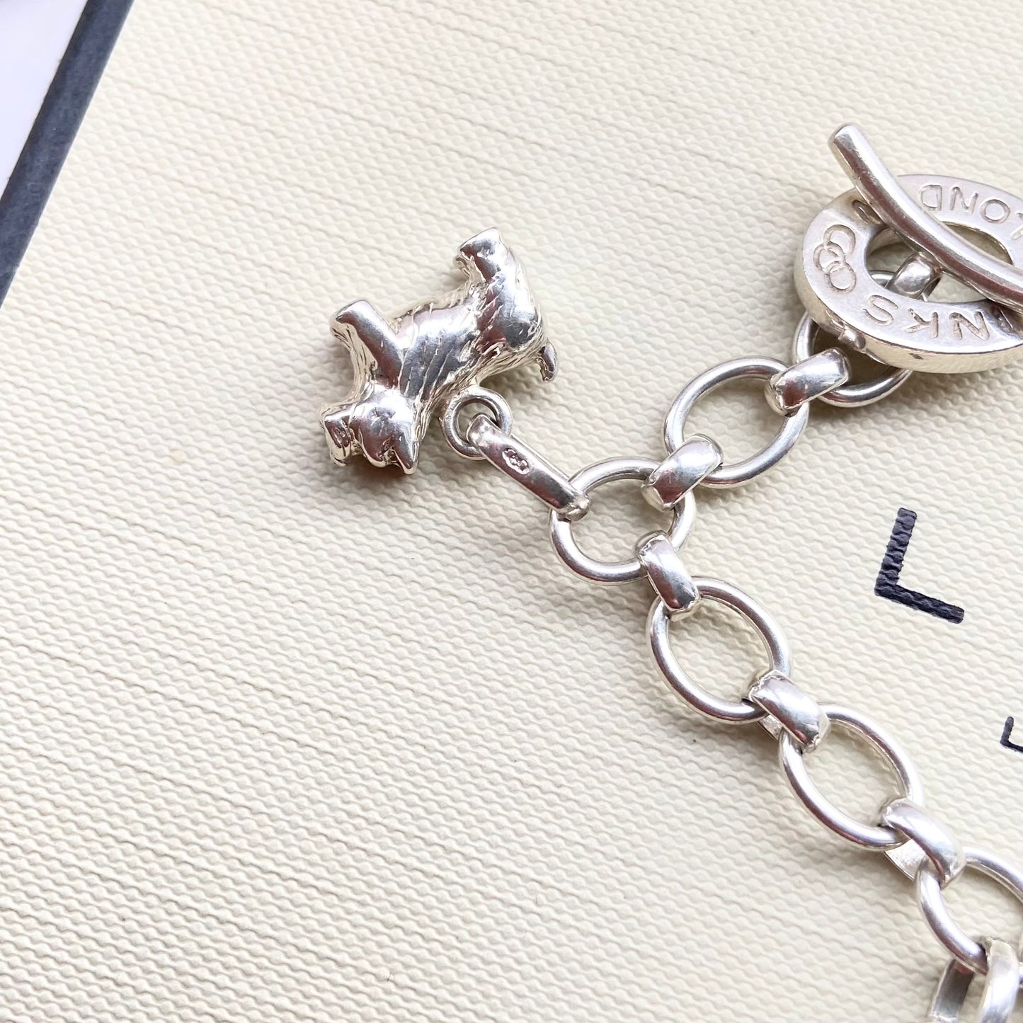 Links of London Very rare Sterling Silver Bracelet including the charms preloved