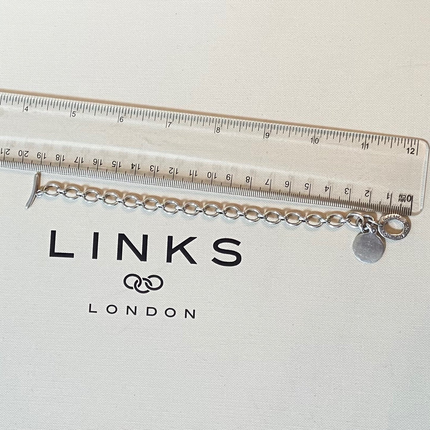 Sterling Silver Links of London Link Chain Bracelet, T Bar Clasp with a clear Disk ideal for engraving.
