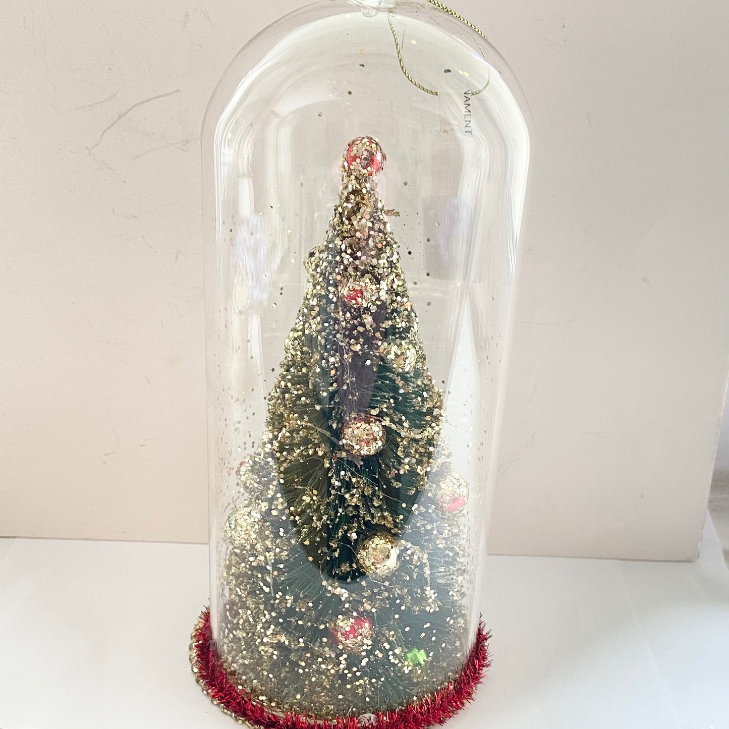 Christmas Tree Decoration in a Glass Dome. Beautiful Holiday Decoration