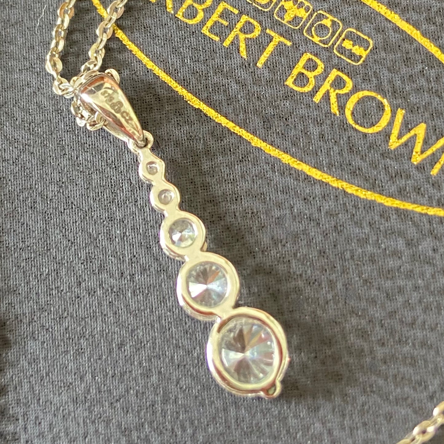 9ct Gold (375) and CZ stones Pendent on a 925 Sterling Silver (925) Necklace