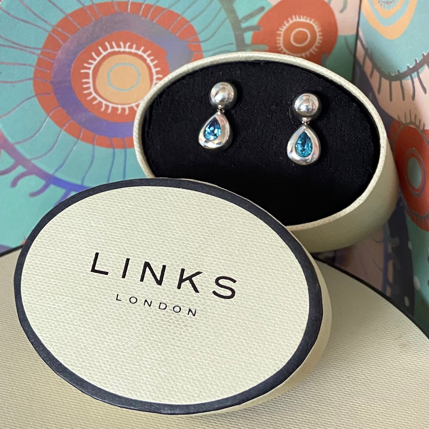 Links of London Tear Drop Earrings with a Blue Topaz Stone