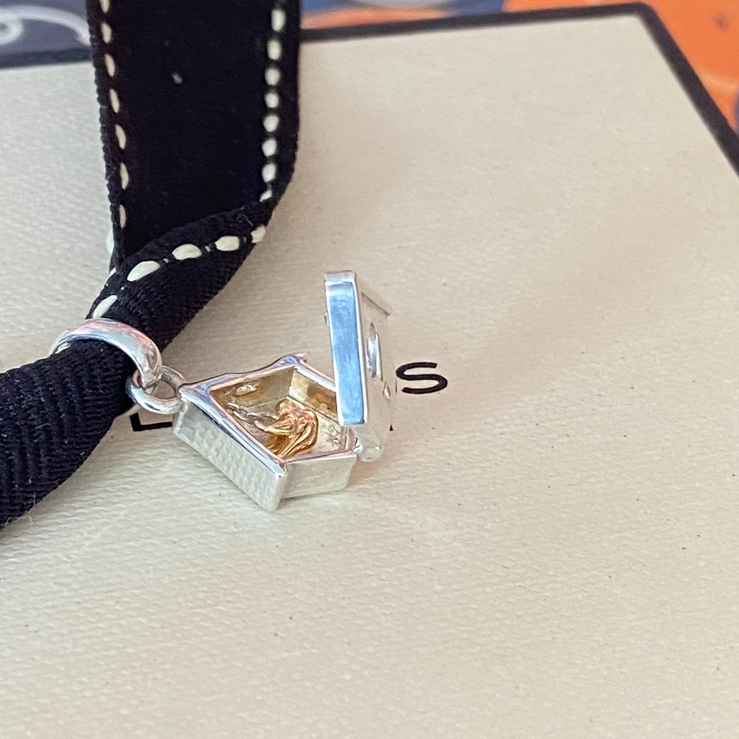 New! Links of London Bird House Charm crafted from Sterling Silver with a Gold 18k Vermeil Bird
