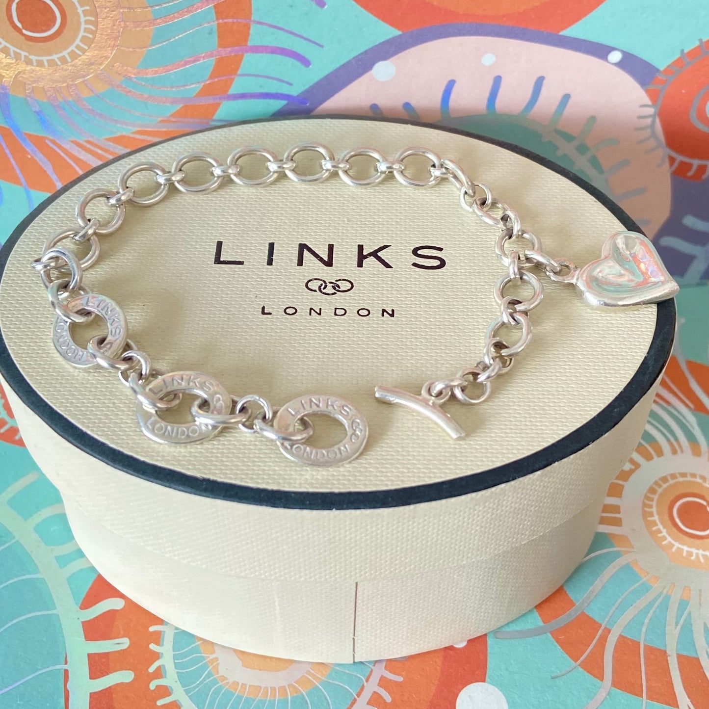 Links of London Bracelet with 3 Links of London Links with a T Bar Clasp and Smudge Heart