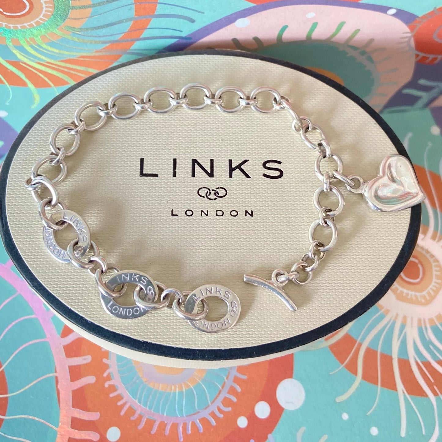 Links of London Bracelet with 3 Links of London Links with a T Bar Clasp and Smudge Heart