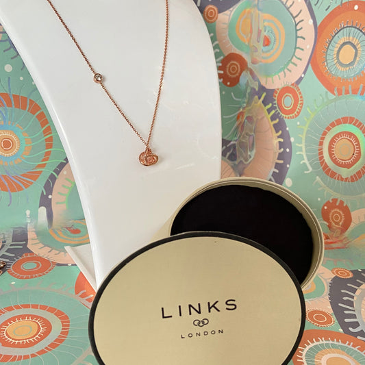 New! Links Of London Love Knot Necklace with Clear Topaz Stone.  Be the first to love this.