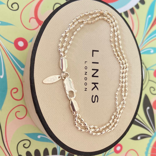 Links of London featuring 3 rows of Rice beads Bracelet 18.5CM