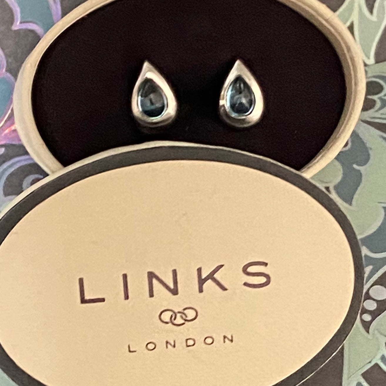 Links of London Sterling Silver Tear Drop Earrings with a Blue Topaz Tear drop Stone