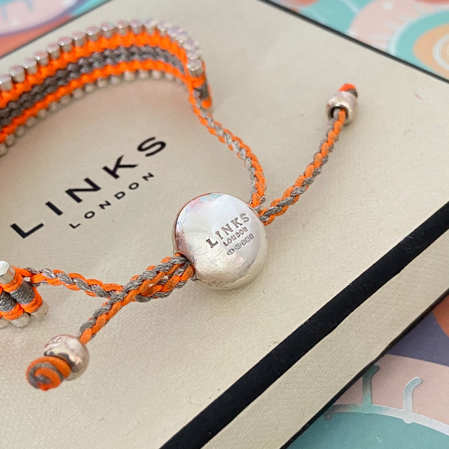Links of London  Orange and Grey Friendship Bracelet