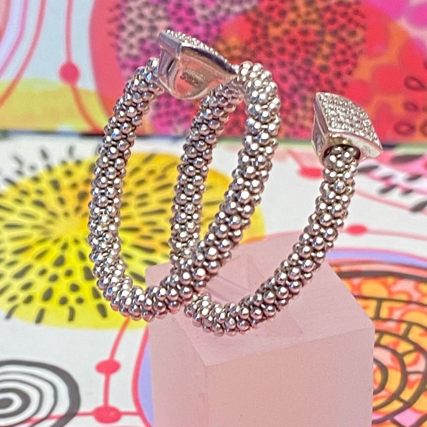 Links of London Sterling Silver Star Dust Wrap Ring with square barrels covered with Sparkly stones.