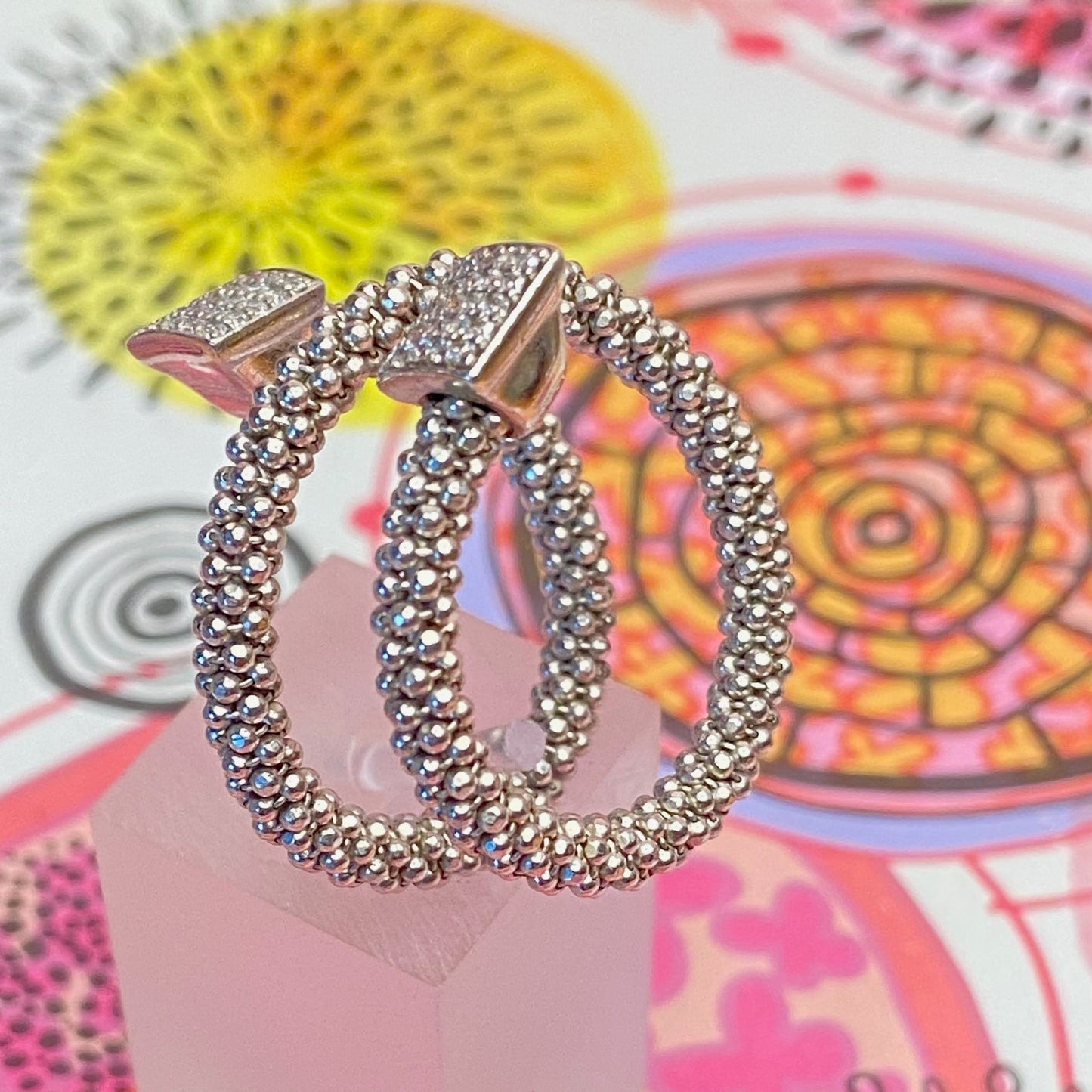 Links of London Sterling Silver Star Dust Wrap Ring with square barrels covered with Sparkly stones.