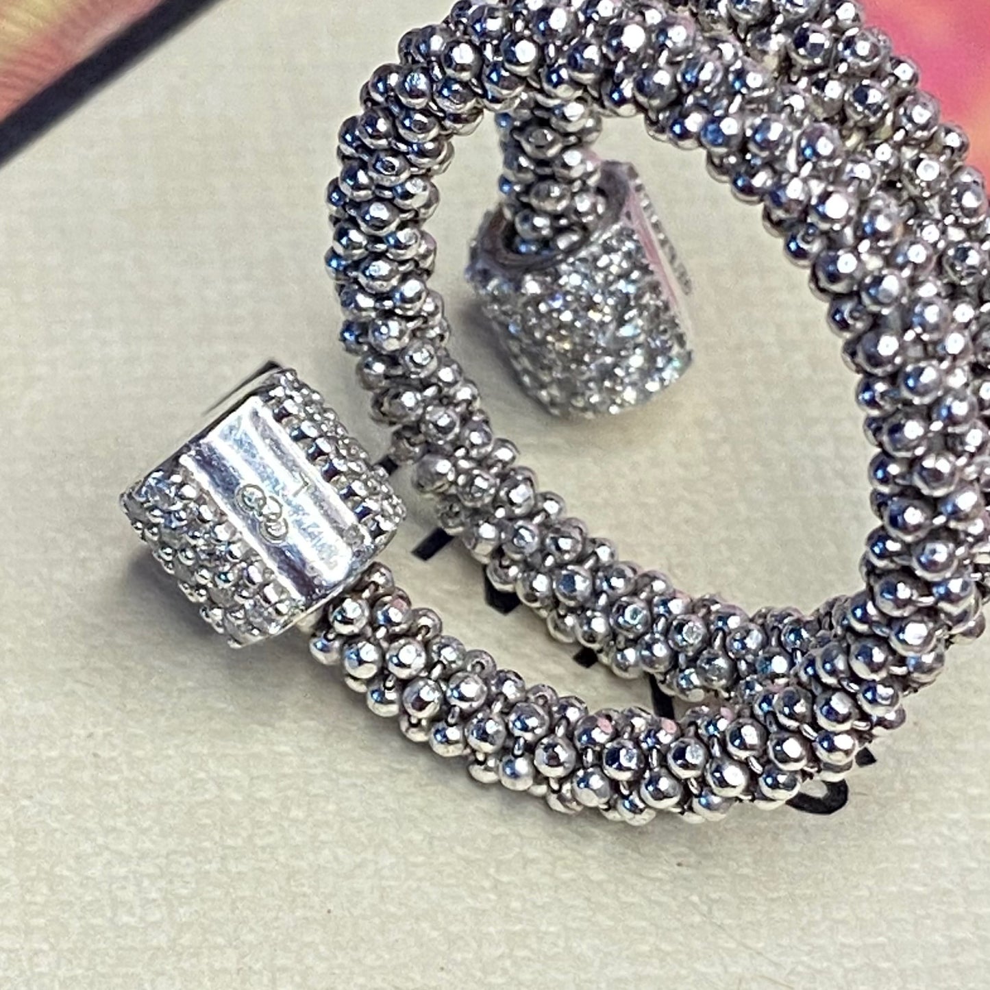 Links of London Sterling Silver Star Dust Wrap Ring with Round barrels covered with Sparkly stones.