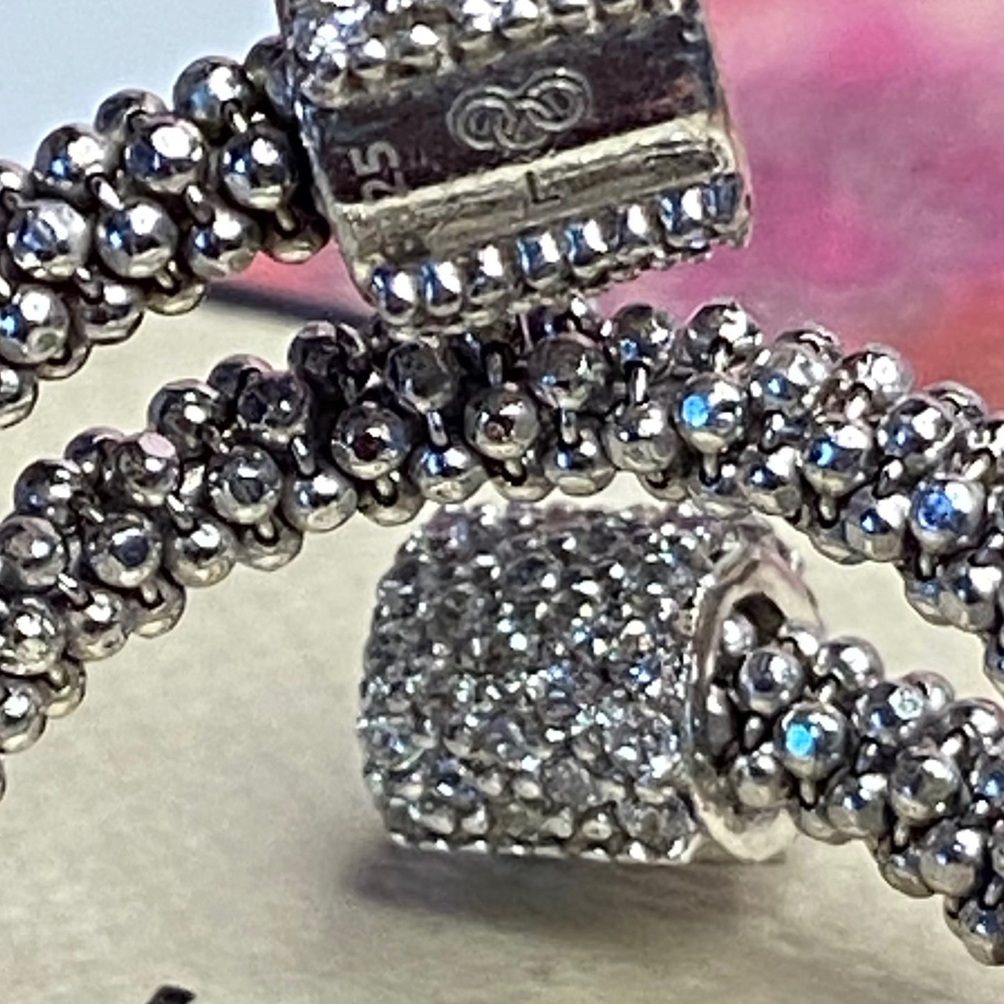 Links of London Sterling Silver Star Dust Wrap Ring with Round barrels covered with Sparkly stones.