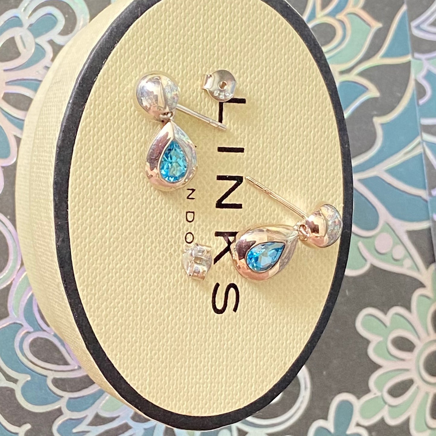 Links of London Sterling Silver Tear Drop Earrings with a Blue Topaz Tear Drop Stone with butterfly backs