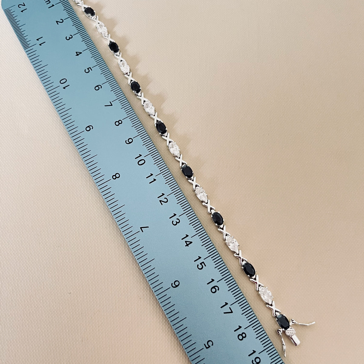 Sterling Silver 925 XOX with Black and Clear Cubic Zirconia Gemstones Tennis bracelet.