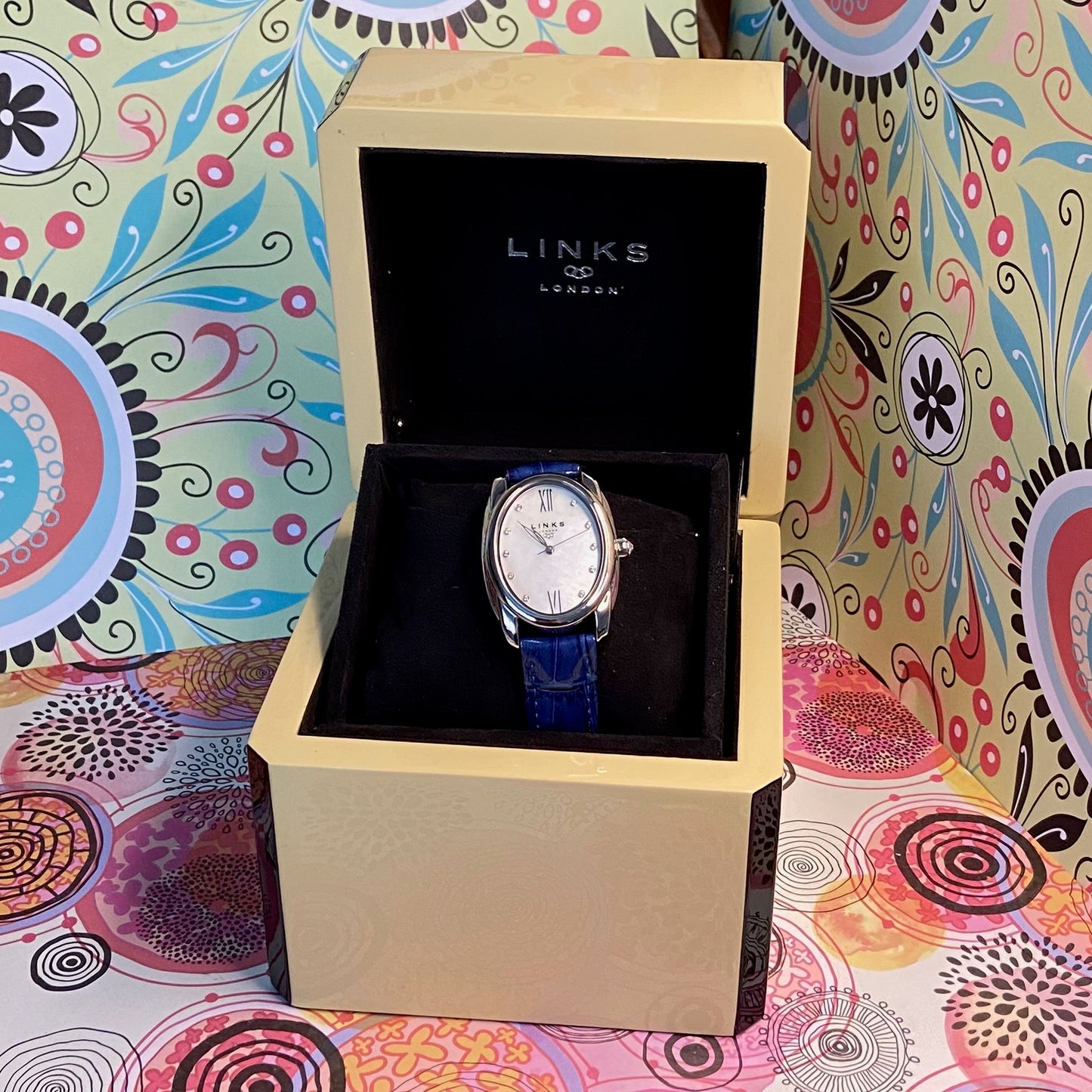 Rare Links of London Driver Ellipse Watch with Mother of pearl face, 10 Sapphire Crystals a Blue Real Leather Strap.