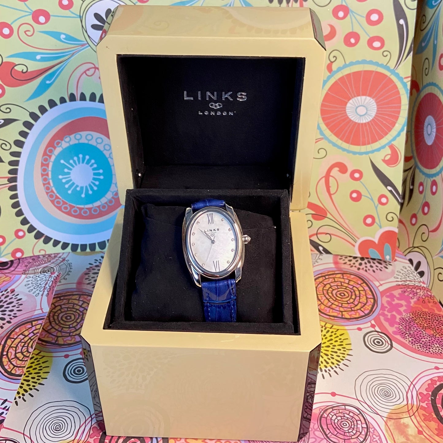Rare Links of London Driver Ellipse Watch with Mother of pearl face, 10 Sapphire Crystals a Blue Real Leather Strap.