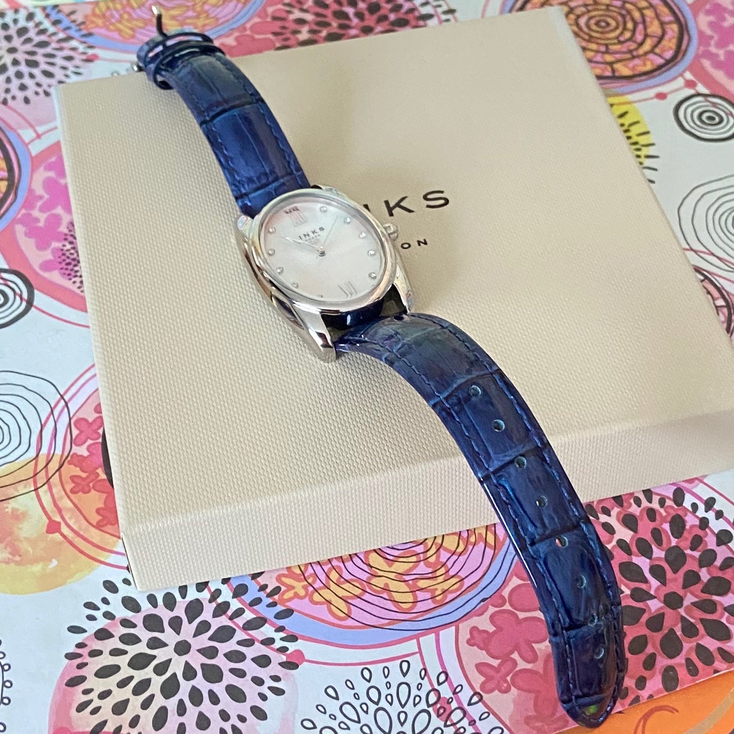 Rare Links of London Driver Ellipse Watch with Mother of pearl face, 10 Sapphire Crystals a Blue Real Leather Strap.