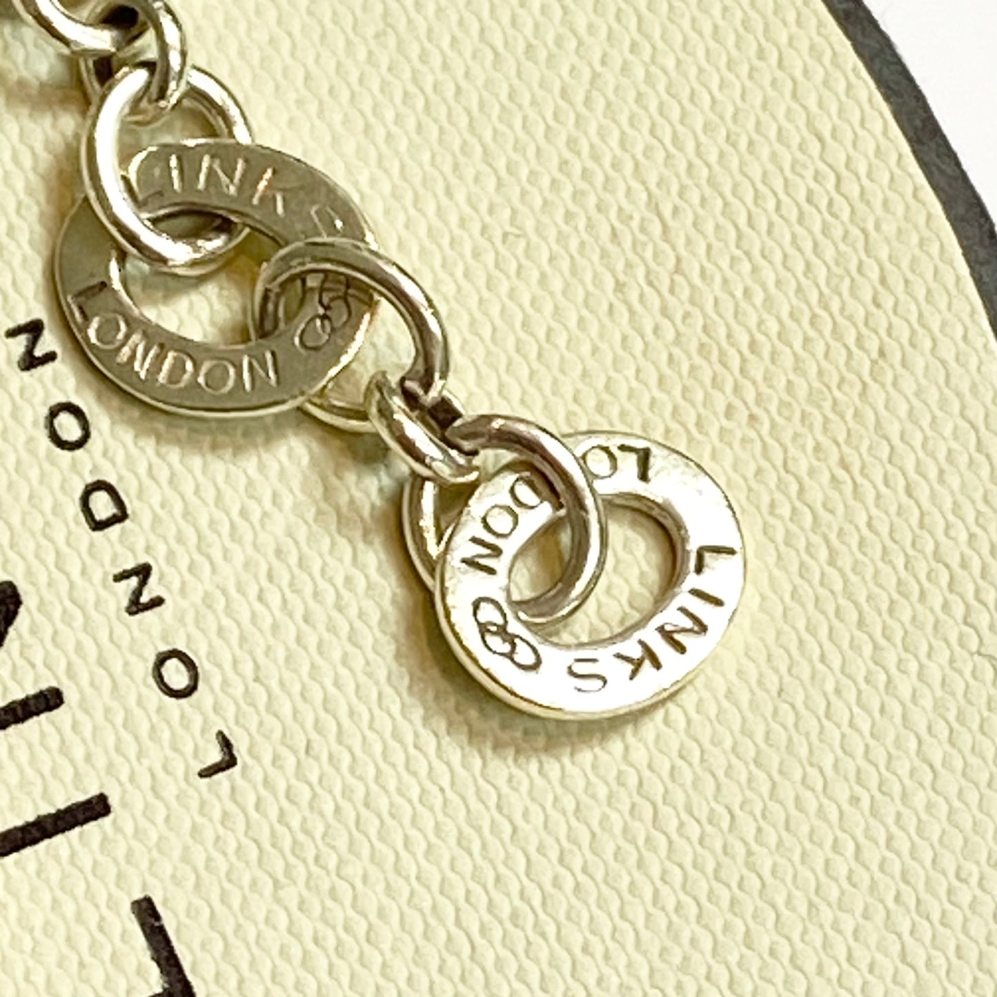 Pre Loved Links of London Silver Bracelet with 3 Links of London Links, Heart charm and T Bar Clasp.