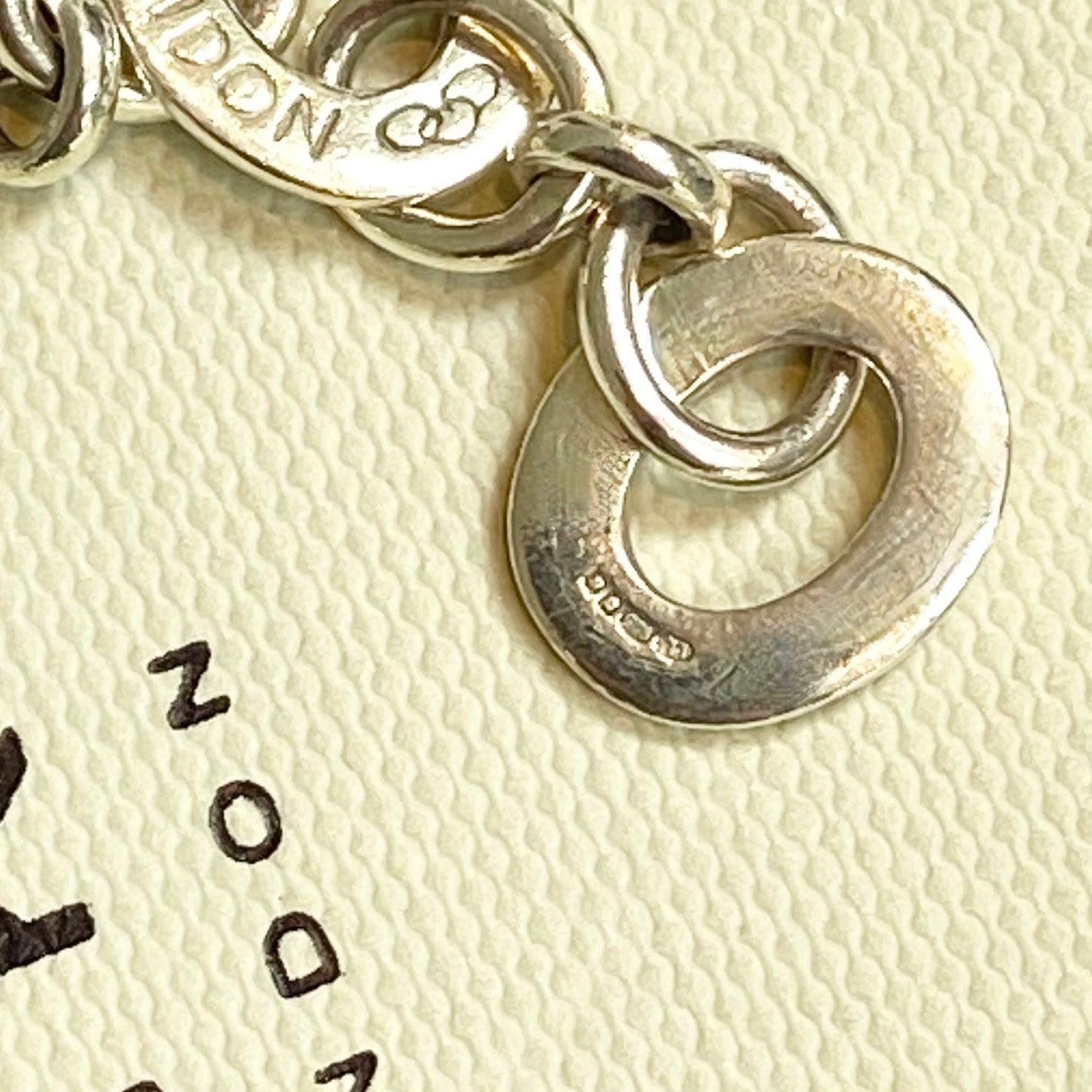 Pre Loved Links of London Silver Bracelet with 3 Links of London Links, Heart charm and T Bar Clasp.