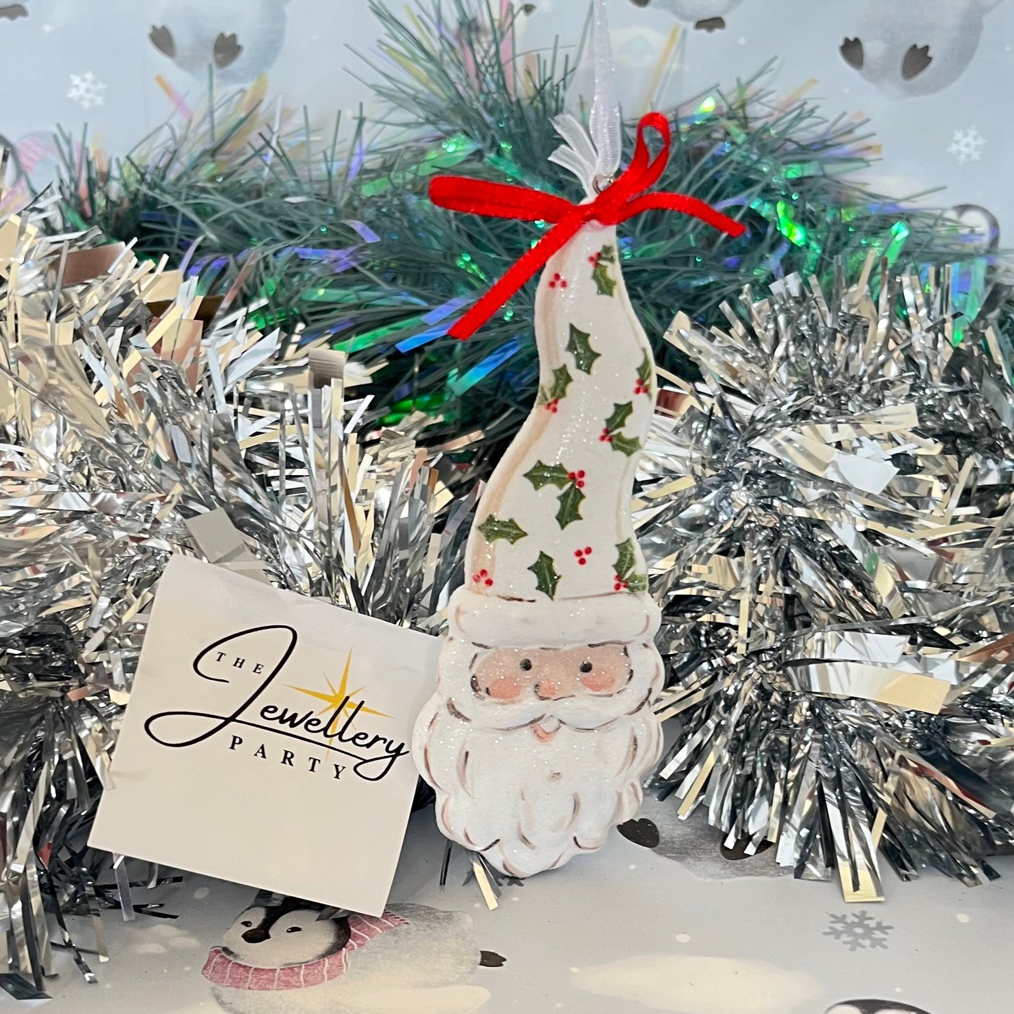 Festive Santa Claus face hanging Christmas tree ornament