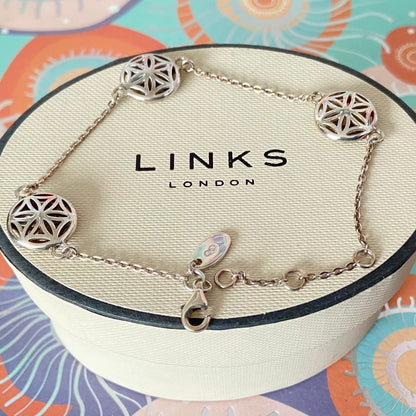 Links of London Bracelet featuring 3 disks with the Flower of Life Design. 20cm adjustable