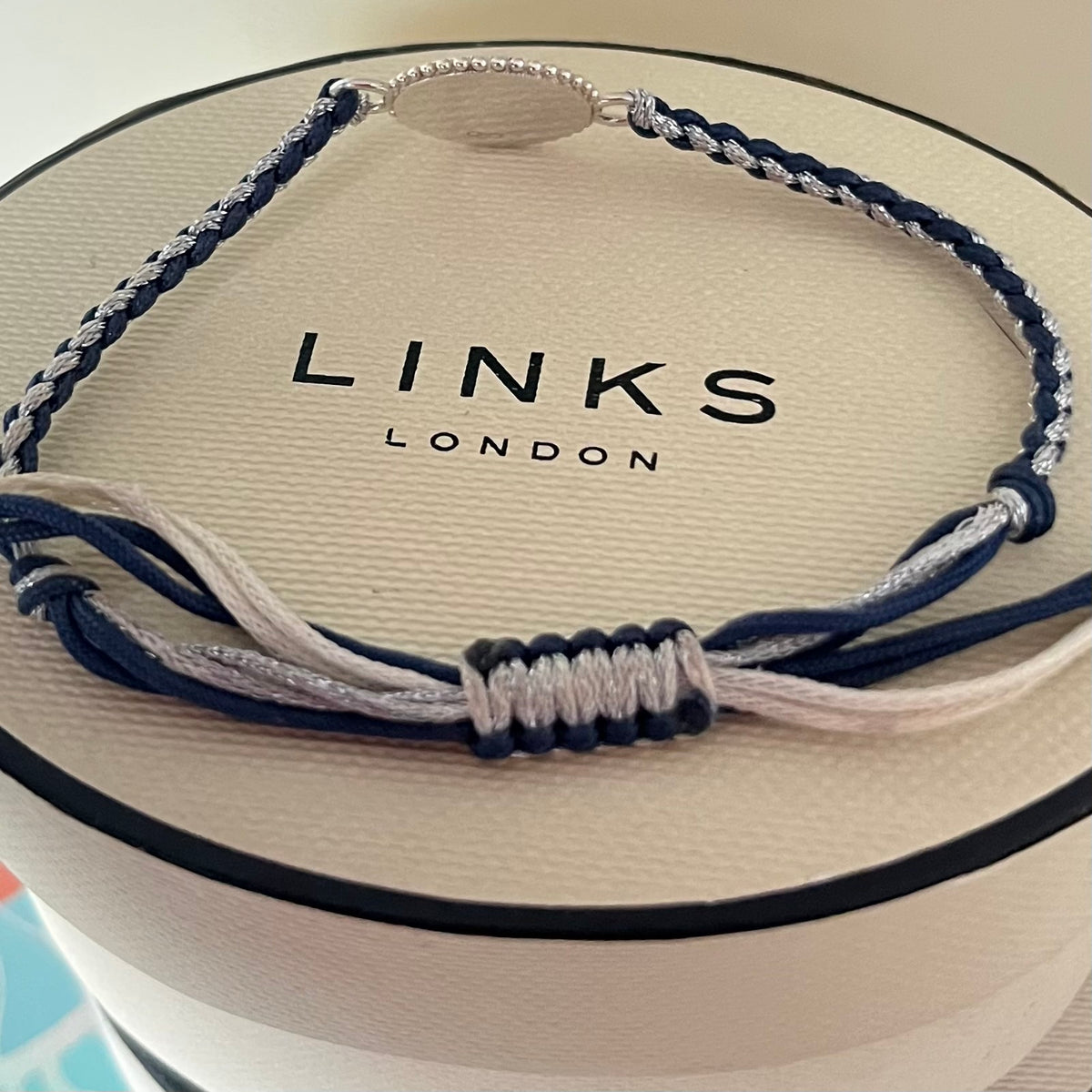 Links of London Sterling Silver Ascot Bracelet with a Navy and Silver Cord.