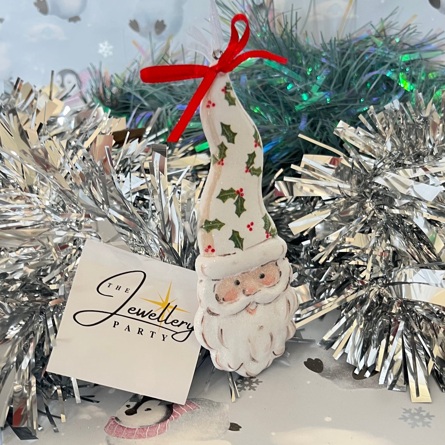 Festive Santa Claus face hanging Christmas tree ornament