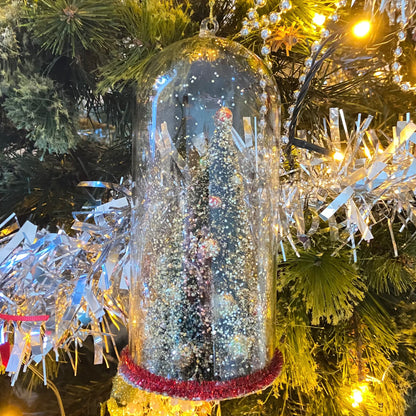Christmas Tree Decoration in a Glass Dome. Beautiful Holiday Decoration