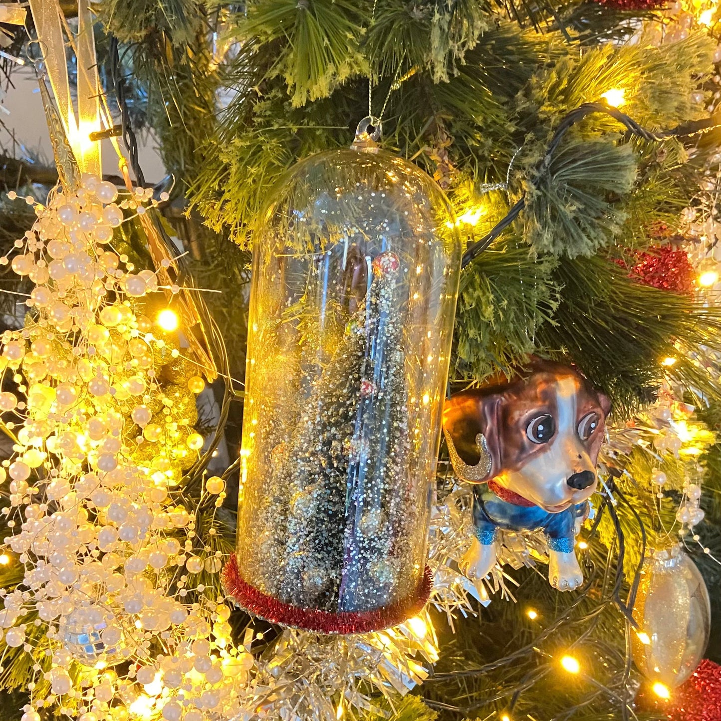 Christmas Tree Decoration in a Glass Dome. Beautiful Holiday Decoration