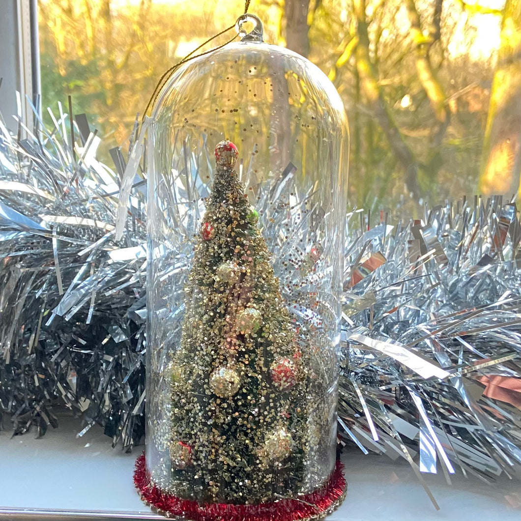 Christmas Tree Decoration in a Glass Dome. Beautiful Holiday Decoration