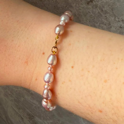 Stunning Pink Cultured Freshwater Pearl Bracelet with a delicate 9ct gold clasps securing it perfectly.  Hallmarked 375 on the clasp presented in a beautiful wooden box
