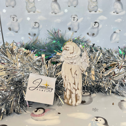 Natural  Distressed Effect Carved Santa hanging ornament holding a Christmas tree