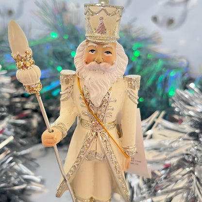 Gisela Graham cream and silver nutcracker figurine holding a staff.