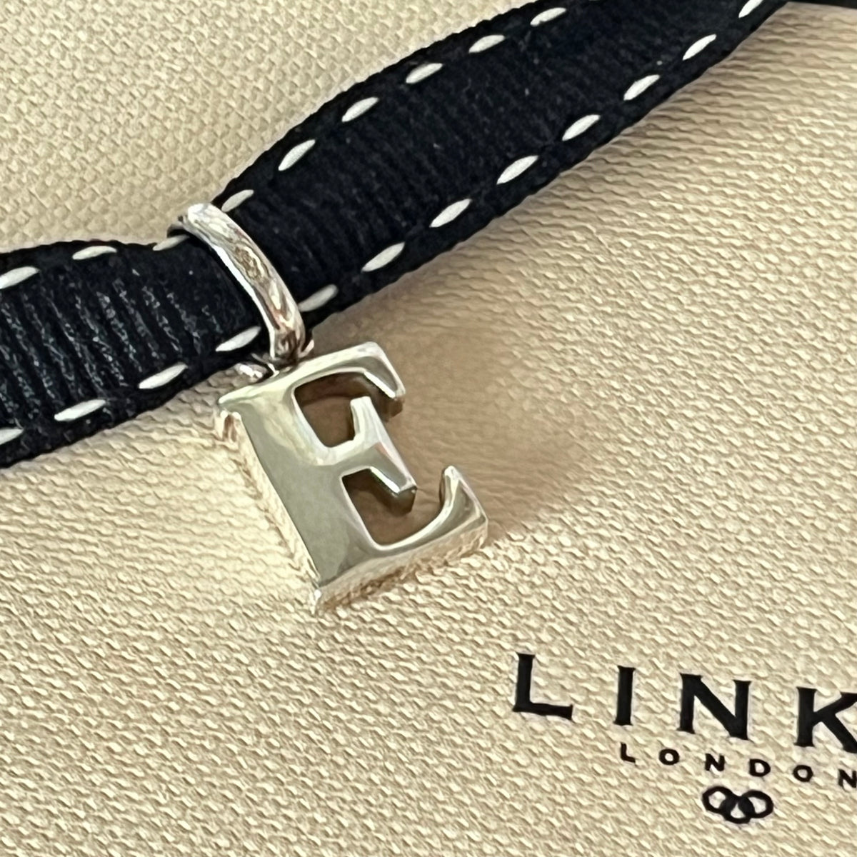 Links of London Sterling Silver Capital Letter E Charm New in the original packaging.