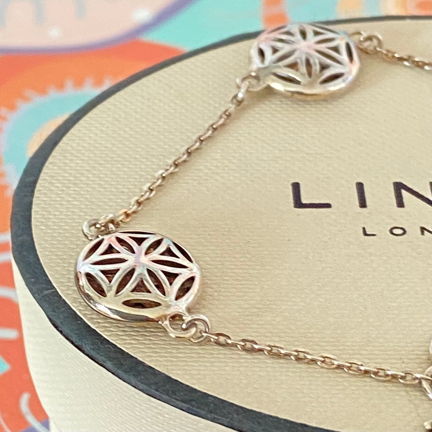 Links of London Bracelet featuring 3 disks with the Flower of Life Design. 20cm adjustable