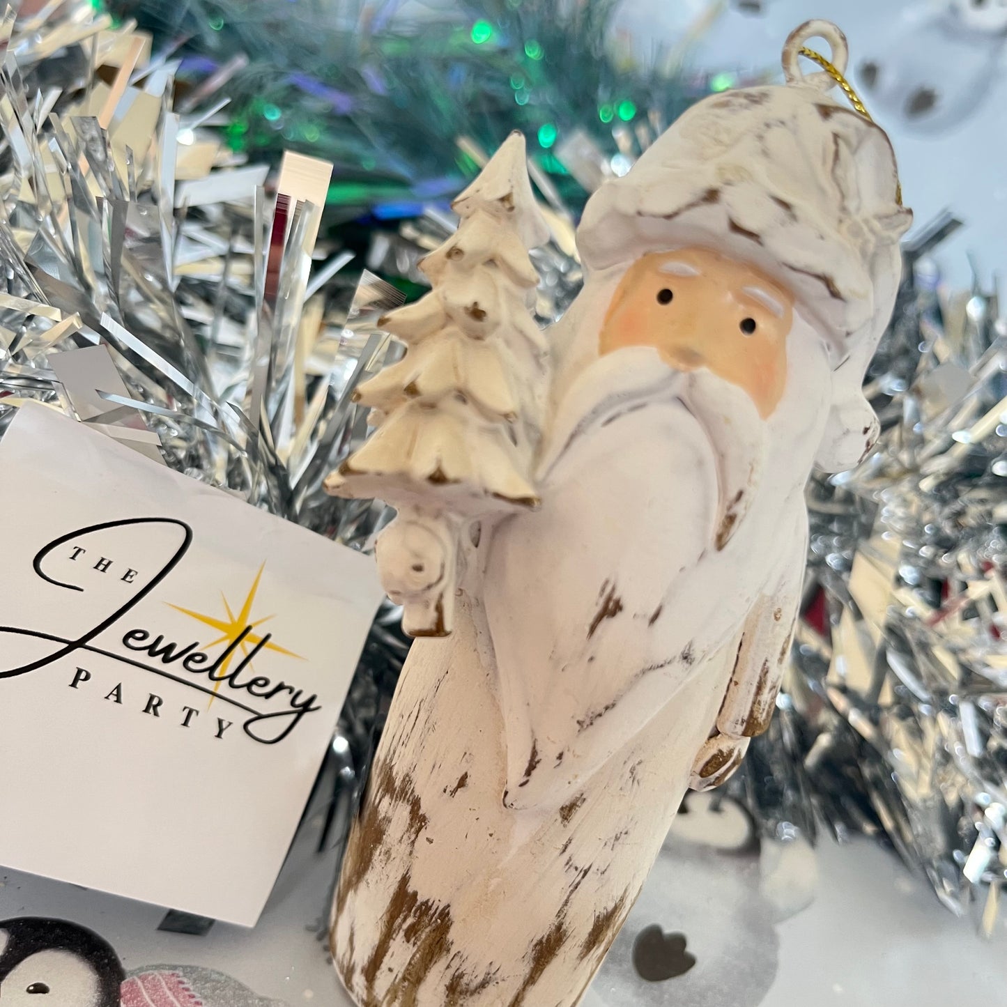 Natural  Distressed Effect Carved Santa hanging ornament holding a Christmas tree