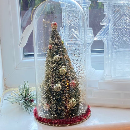 Christmas Tree Decoration in a Glass Dome. Beautiful Holiday Decoration