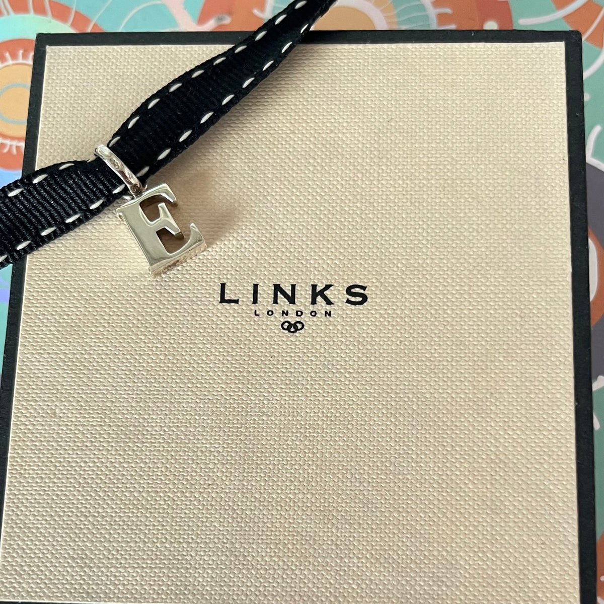 Links of London Sterling Silver Capital Letter E Charm New in the original packaging.