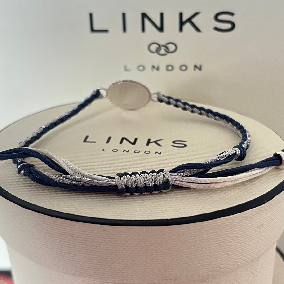 Links of London Sterling Silver Ascot Bracelet with a Navy and Silver Cord.