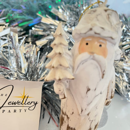 Natural  Distressed Effect Carved Santa hanging ornament holding a Christmas tree