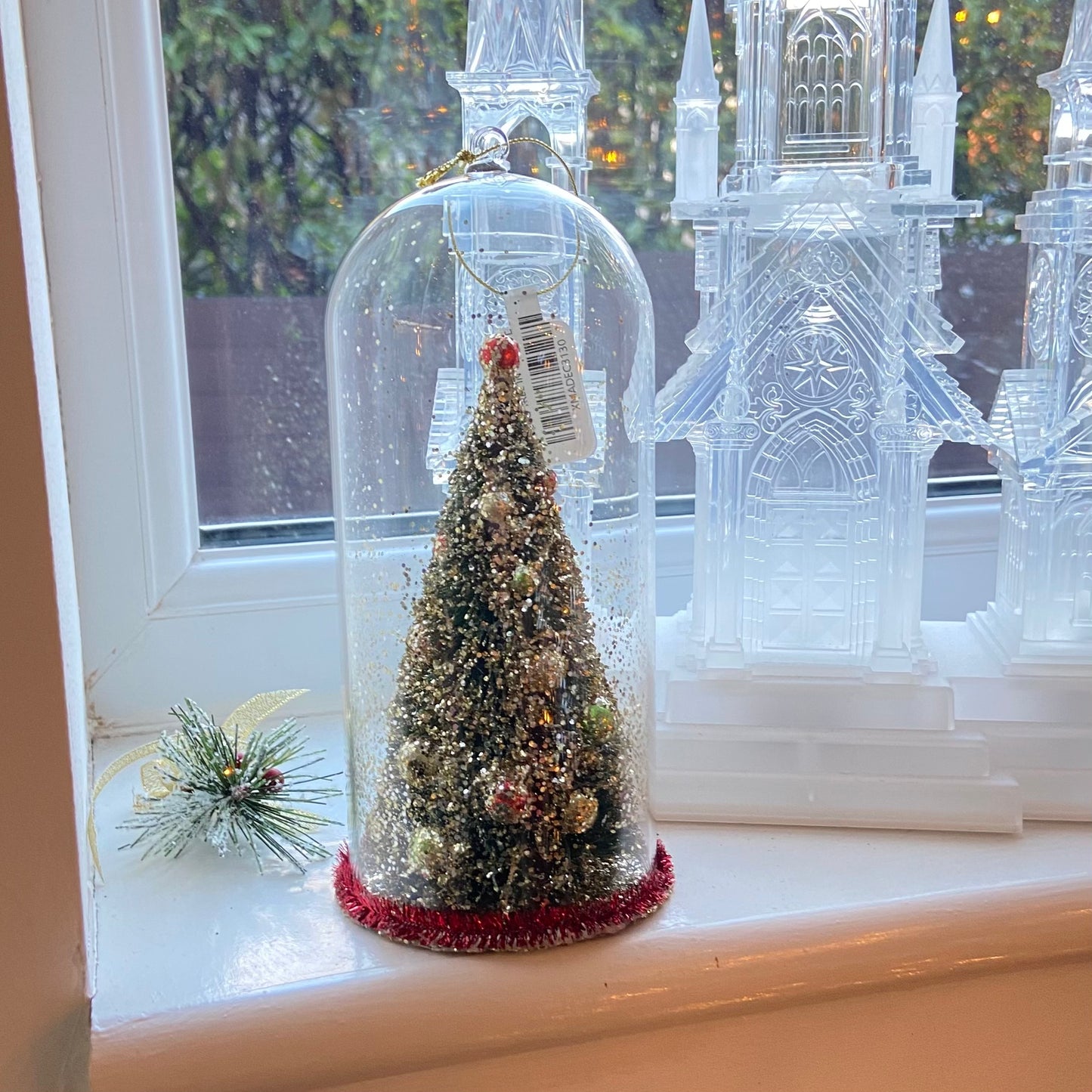 Christmas Tree Decoration in a Glass Dome. Beautiful Holiday Decoration