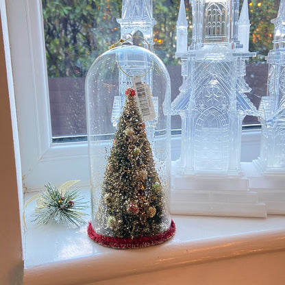 Christmas Tree Decoration in a Glass Dome. Beautiful Holiday Decoration