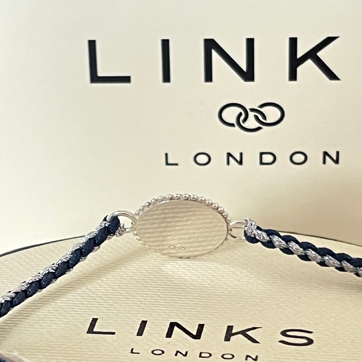 Links of London Sterling Silver Ascot Bracelet with a Navy and Silver Cord.