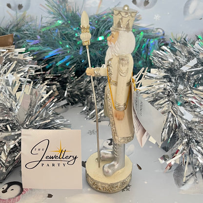 Gisela Graham cream and silver nutcracker figurine holding a staff.