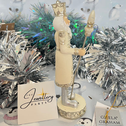 Gisela Graham cream and silver nutcracker figurine holding a staff.