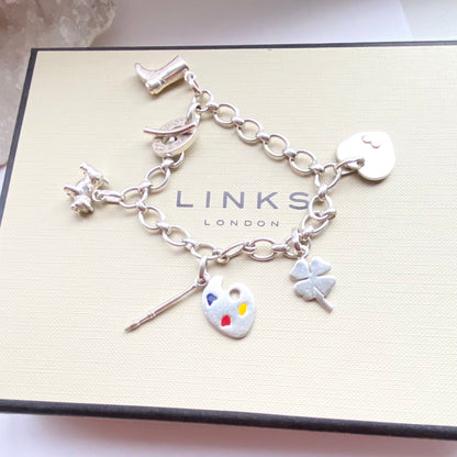 Links of London  Very rare Sterling Silver Bracelet including the charms preloved