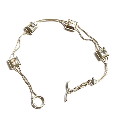 Authentic Sterling Silver Links of London four square bracelet ideal for that extra sparkle.