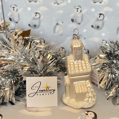 shimmering  champagne glass church Christmas ornament accented with sparkling glitter snow details
