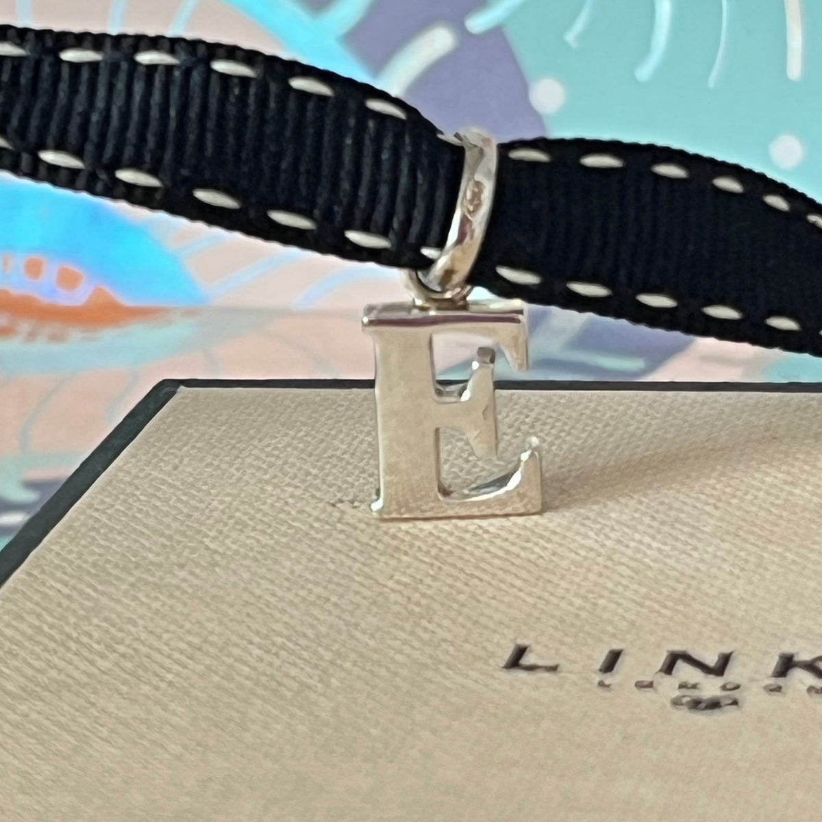 Links of London Sterling Silver Capital Letter E Charm New in the original packaging.
